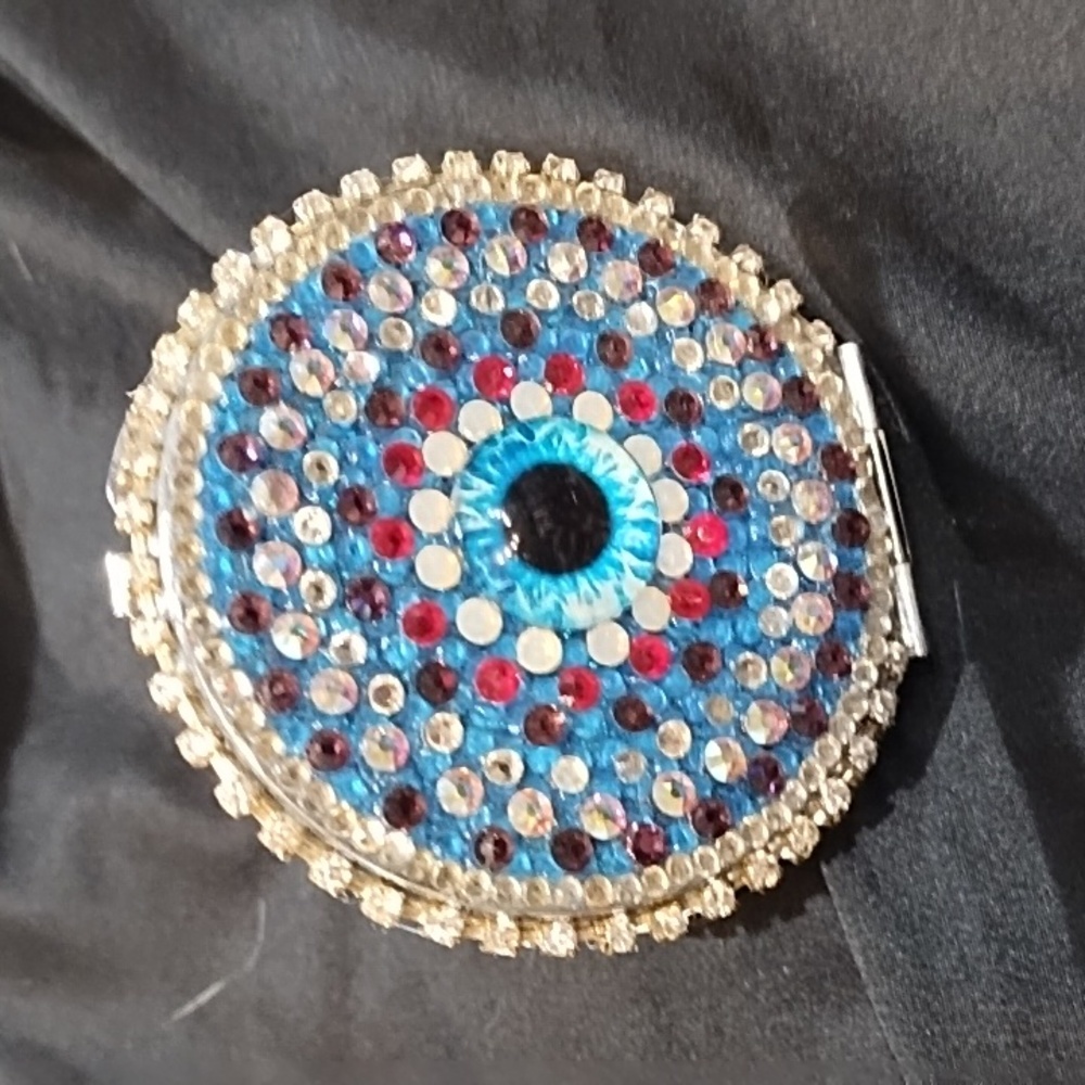 Jewelry embellished pocket mirror